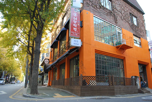 An orange cafe on Garosugil street in Seoul.