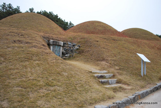 Three mounded royal Baekjae royal tombs on a hillside near Gongju city, South Korea.