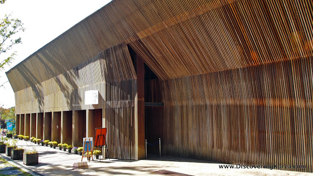 Modern buidling covered with rows of vertical steel cables at Heyri Artists Village in Paju Korea.