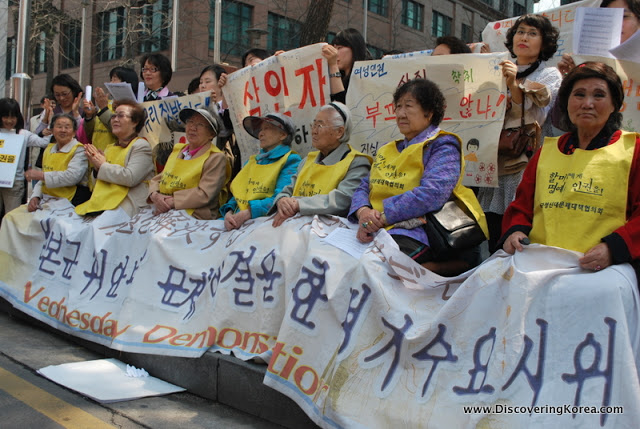 Seven former Korean Comfort Woman performing their weekly demonstration demanding a formal apology from the Japanese government.