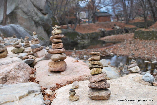 Small stacks of stones along a pathway near the Beopjusa Buddhist Temple.